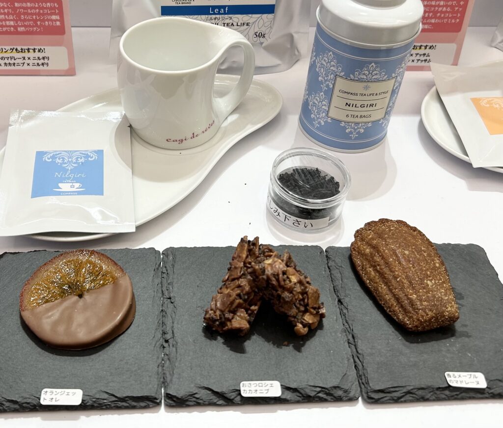 阪急バレンタインチョコレート博覧会2026で紹介されていた紅茶とオランジェットを中心としたチョコ菓子のディスプレイ
